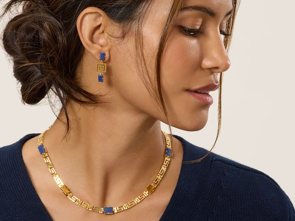 Gold necklace with blue gemstone details